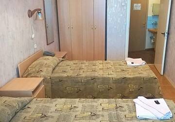 Фото номера Номер эконом с 2 односпальными кроватями Гостиница «Меридиан» г. Архангельск 3